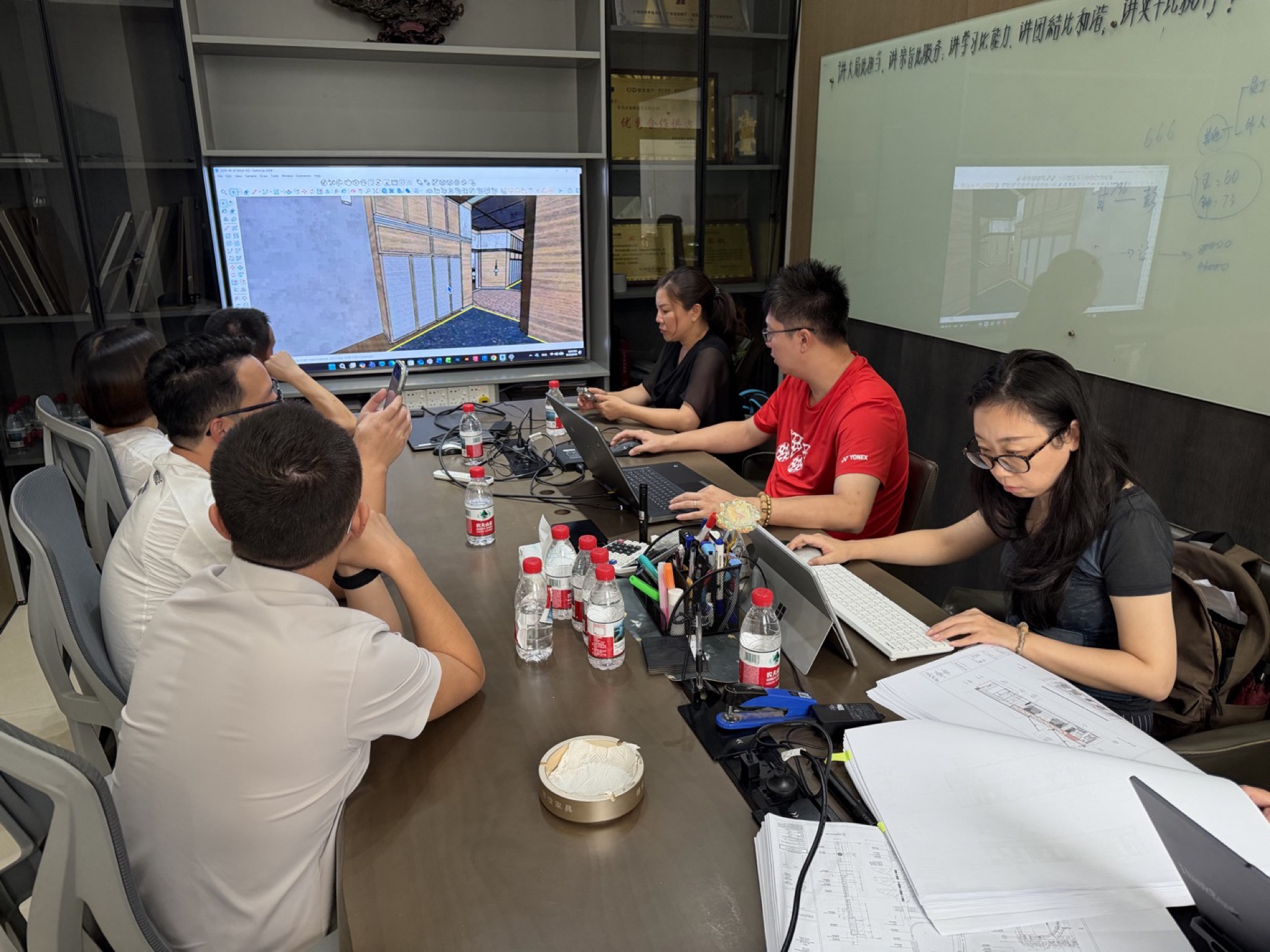 Shop drawing review projected on screen with factory team